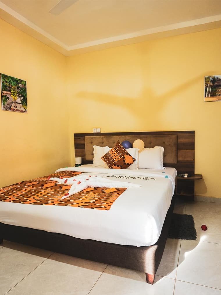 A Mountain View Deluxe bedroom, looking inland toward the hills