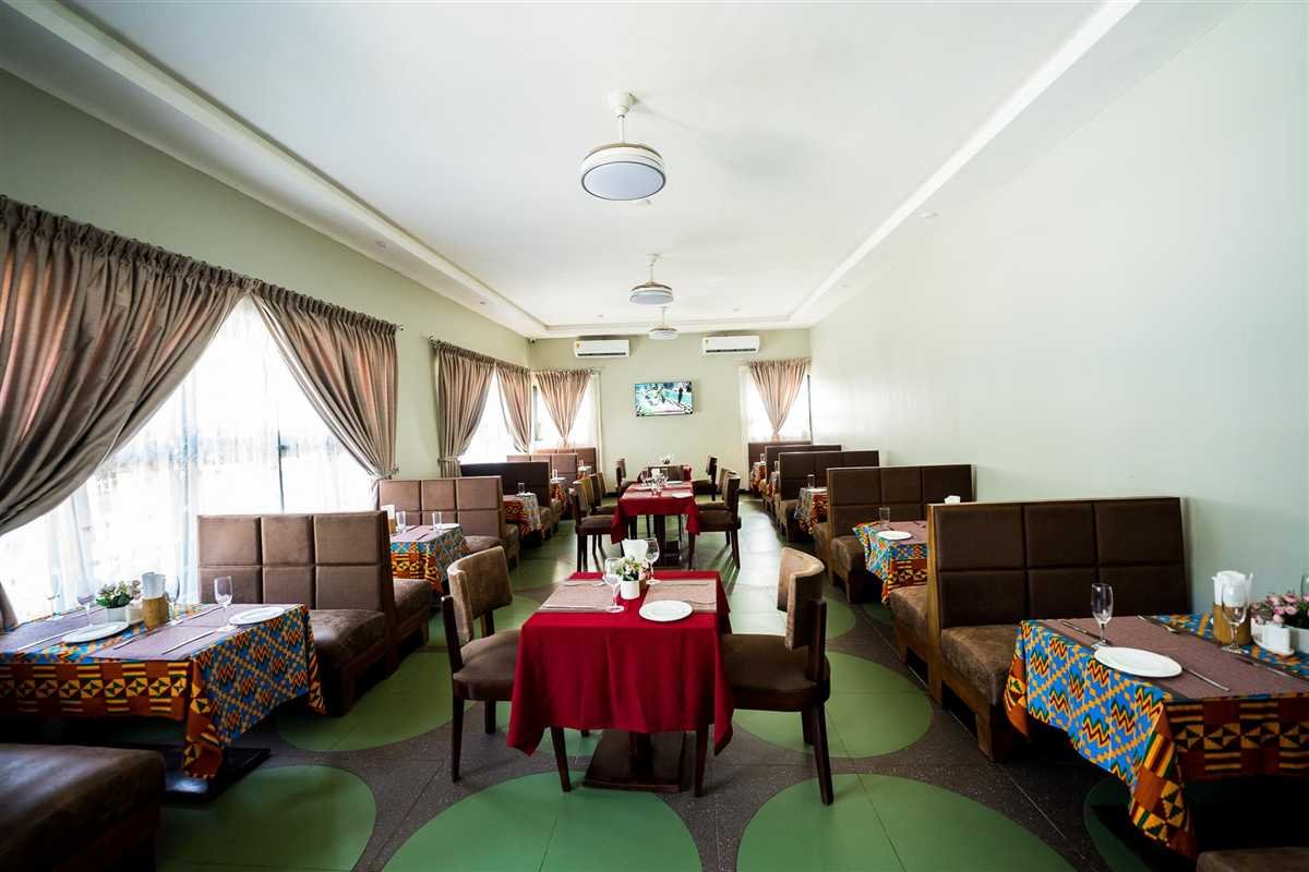 The restaurant dining room, tables laid