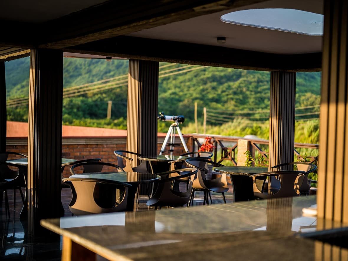 The rooftop lounge looking inland at the hills
